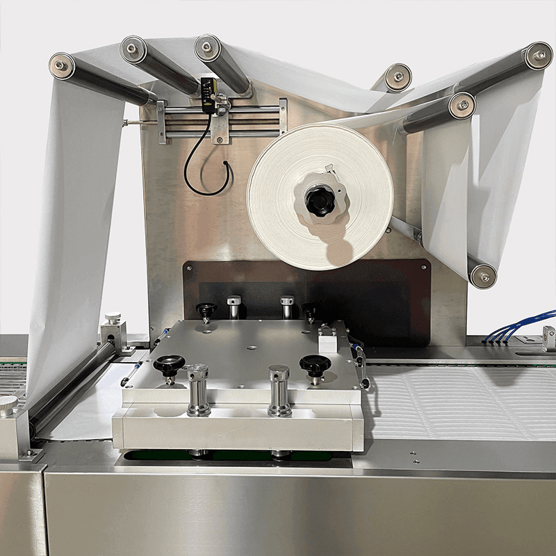 Thermoform vacuum packing top film structure